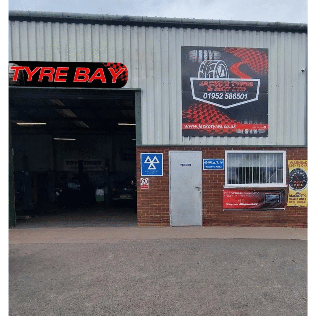 Front view of our garage building, showing the main entrance and workshop frontage